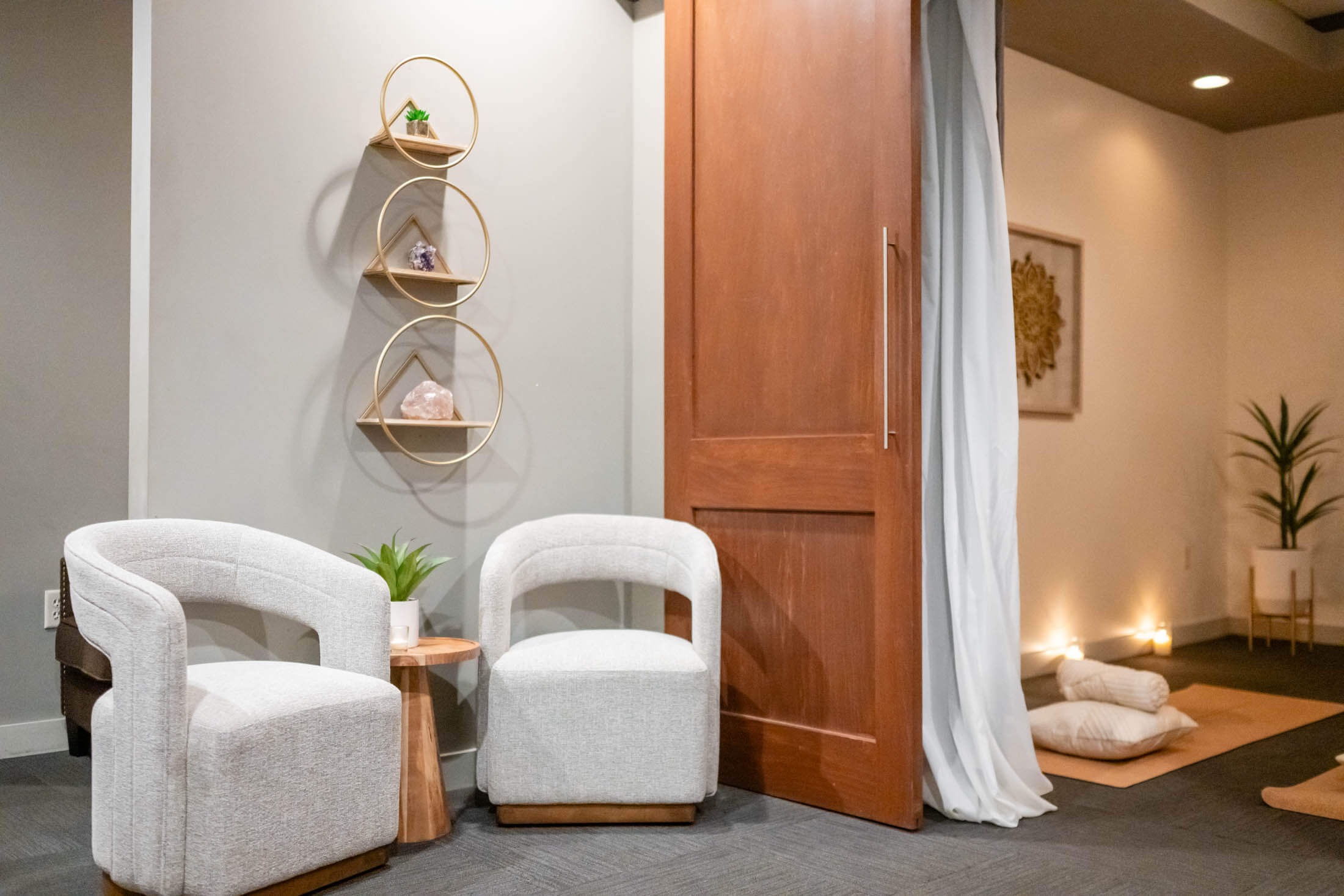 Modern spa lounge with cozy seating area.