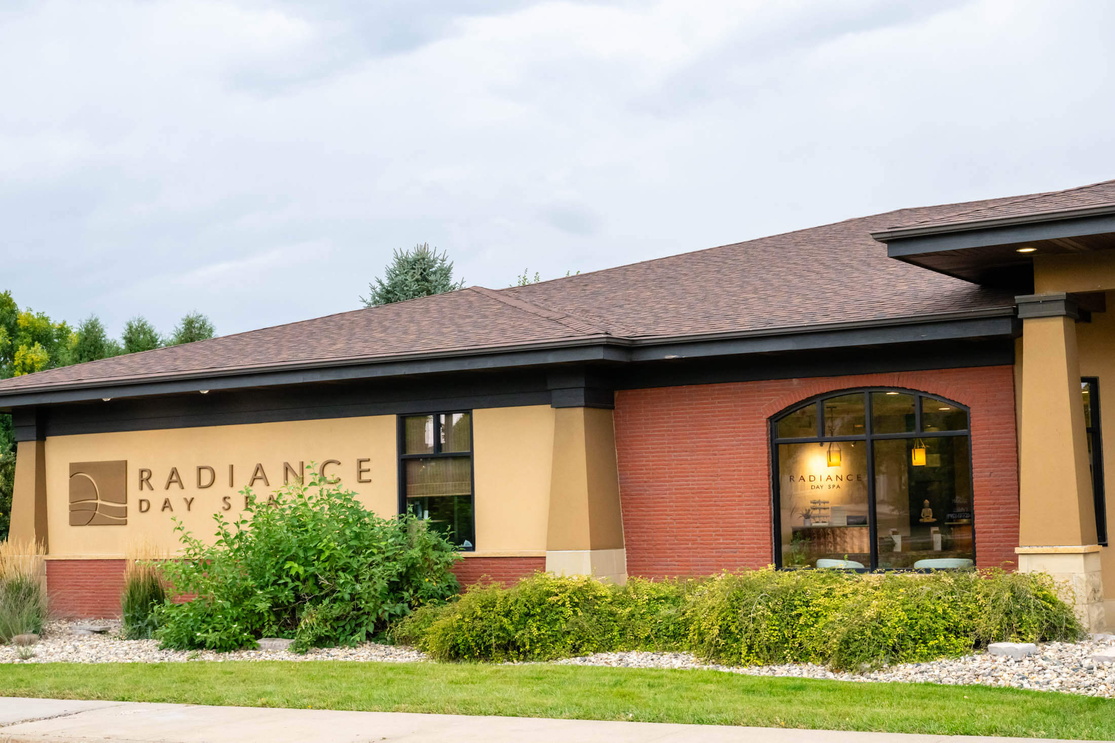 Day spa building with landscaped garden.