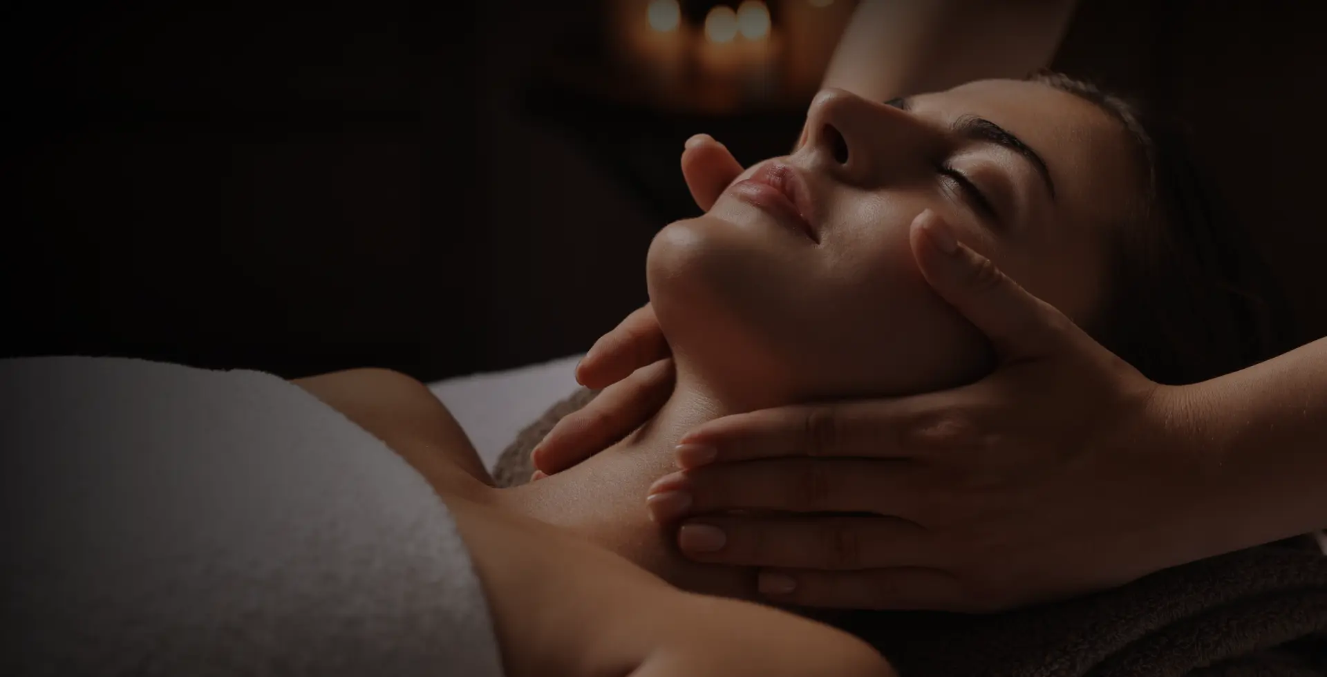 A client receives a relaxing facial massage as part of a therapeutic spa session.
