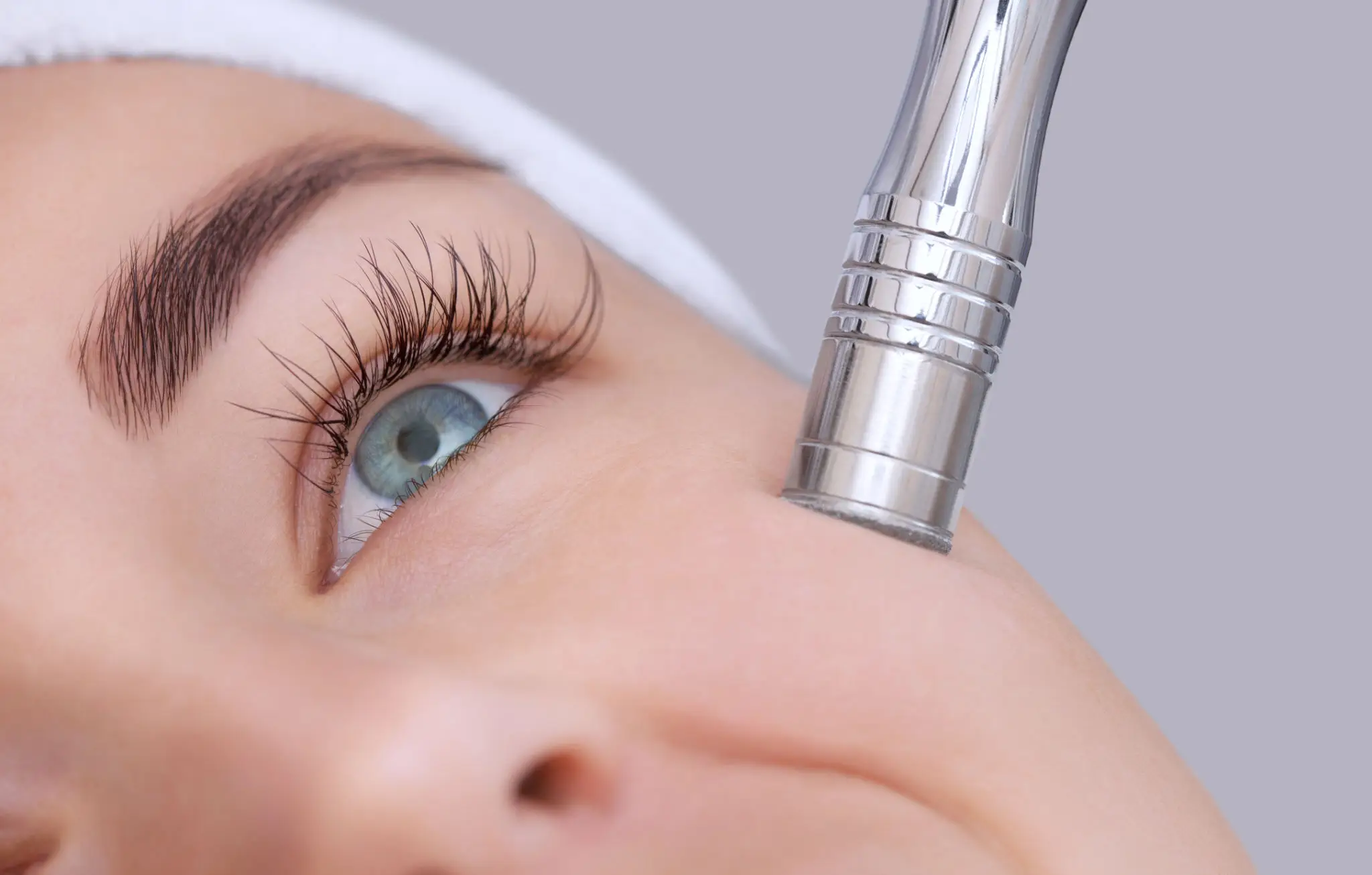 A specialized skincare tool is used to perform advanced restorative facials.